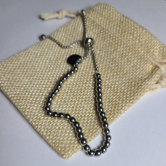 Pulsera colgante plateada | Acero quirúrgico